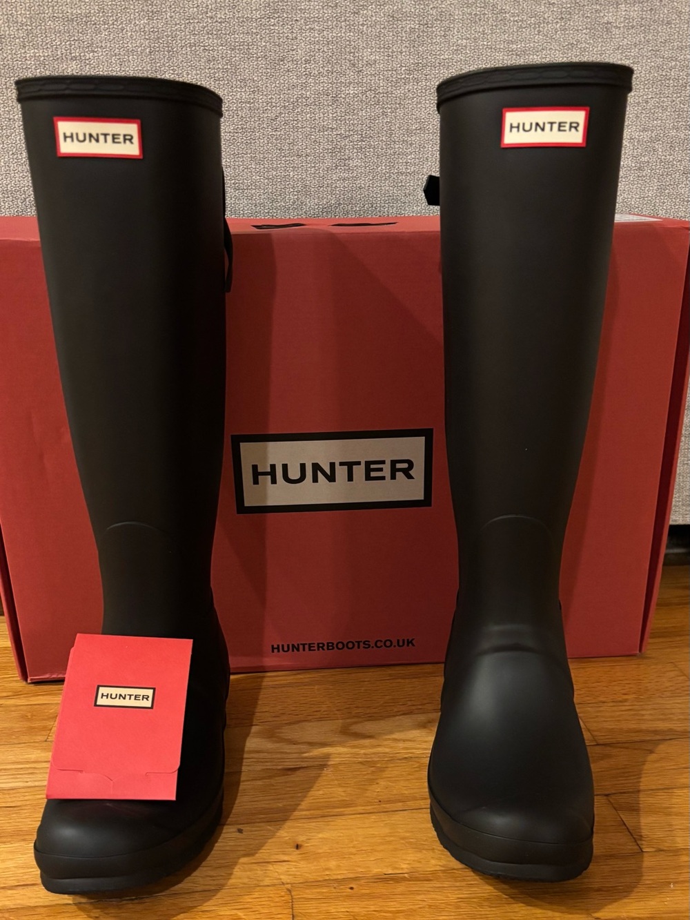 Hunter Tall Black Rain Boots with Red Logo Accents
